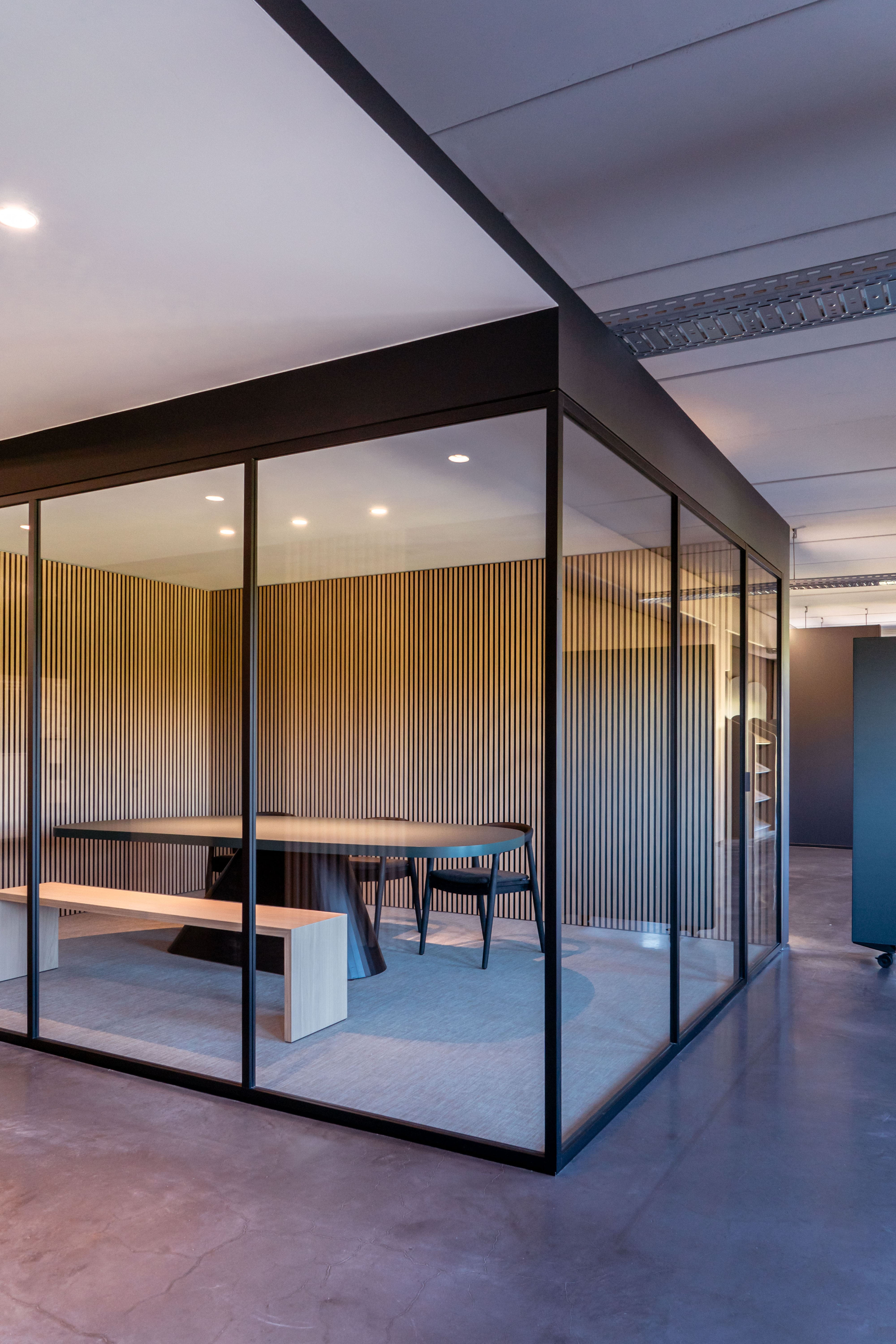 Glass room divider in corner unit combined with a glass door from argenta's divina range (arlu).